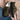 Damen Lace-Up Sneaker Art déco, Paar von vorne: goldenes Fächermuster allover auf Schwarz, schwarze Sohle – powered by Nyrra-Design