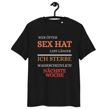 schwarzes T-Shirt mit Spruch wer öfter sex hat lebt länger ich sterbe wahrscheinlich nächste woche, bunter Text in rot, orange und weiß
