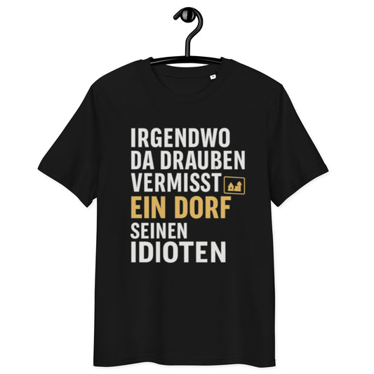 schwarzes T-Shirt mit Spruch irgendwo da draußen vermisst ein dorf seinen idioten in weiß und gold, kleines Dorf-Icon

