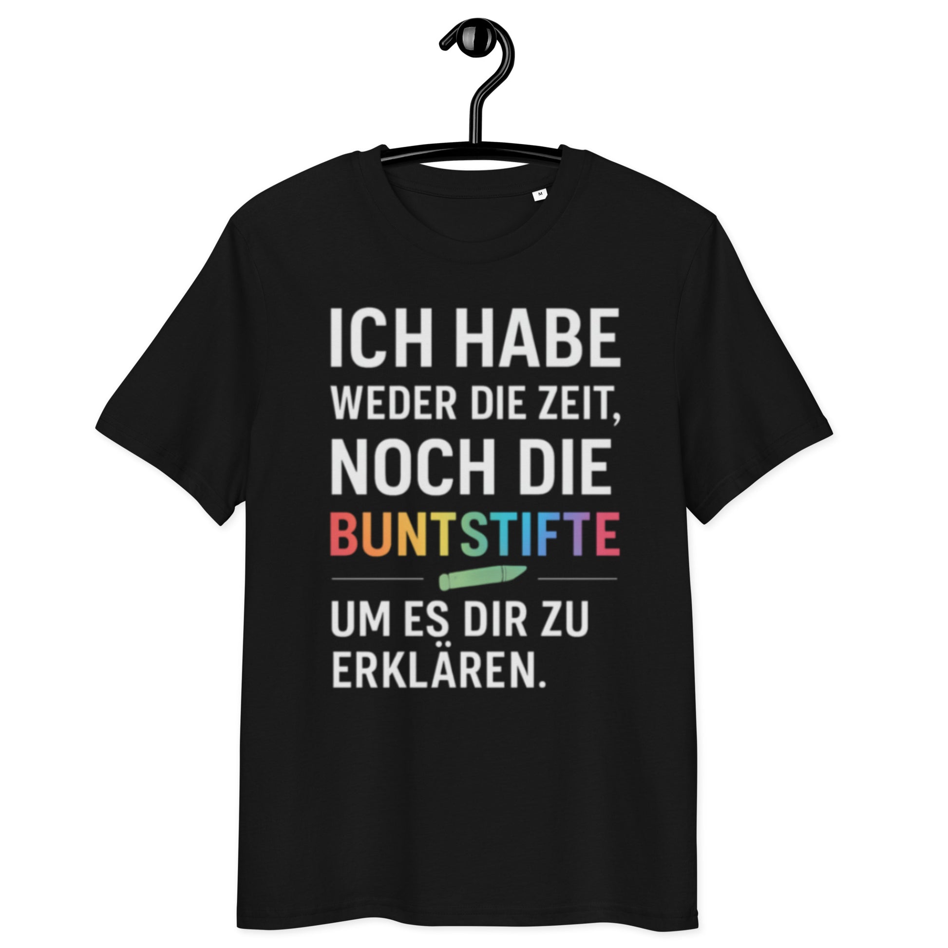 schwarzes T-Shirt mit Spruch ich habe weder die zeit noch die buntstifte um es dir zu erklären, buntstifte bunt hervorgehoben, kleiner grüner Stift
